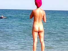 Hot Nudist Girls Tanning Naked In The Beach