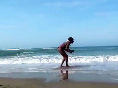 Busty ebony having sex with white men on the beach
