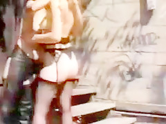 Lesbian sex in a backyard