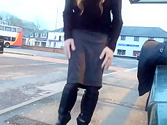 Tranny daring public bus station