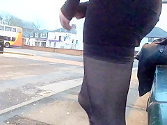 Tranny daring public bus station