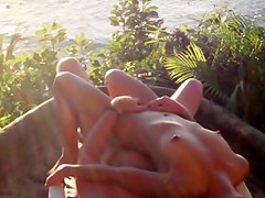 Fucking my small filipina wife on the beach in Mexico.