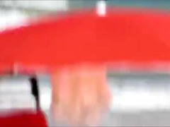 Topless legal age teenager playing at beach in water