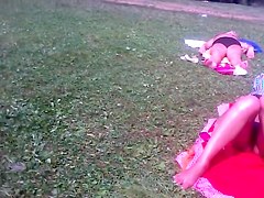 Spying hot slender body of girl getting sun tanned PICT0008