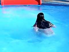 Sweet brunette doll has lost her bikini panty in the pool