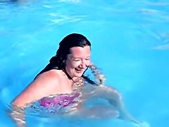 Sweet brunette doll has lost her bikini panty in the pool