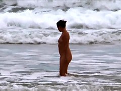 Real female nudist is spied with naked ass on the beach