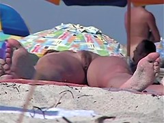 Kinky voyeur takes a sexy trip to the nudist beach