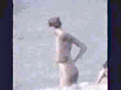 Nicely peeping on naked girl on the nudist beach during the afternoon