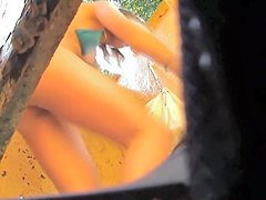 I spied girl pantieless and in black shorts in beach cabin