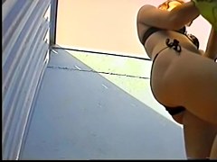 Bikini girl spied pantieless in beach changing room