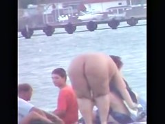 Horny voyeur enjoys the hot view on the nude beach