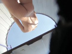 Beach cabin voyeur video with the naked teen spied