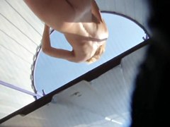 Beach cabin voyeur video with the naked teen spied