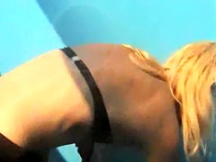 Girls from the beach show pussies and tits in beach cabin