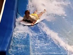 Sexy flowrider is demonstrating her downblouse in aqua park