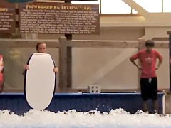 Sexy flowrider is demonstrating her downblouse in aqua park