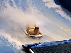 Sexy flowrider is demonstrating her downblouse in aqua park