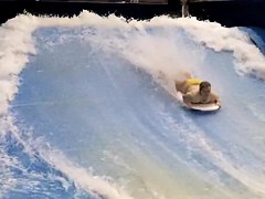 Sexy flowrider is demonstrating her downblouse in aqua park