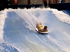 Sexy flowrider is demonstrating her downblouse in aqua park