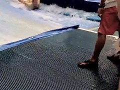 Sexy flowrider is demonstrating her downblouse in aqua park