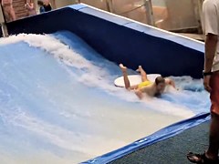 Sexy flowrider is demonstrating her downblouse in aqua park