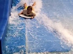 Sexy flowrider is demonstrating her downblouse in aqua park