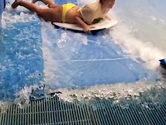 Sexy flowrider is demonstrating her downblouse in aqua park