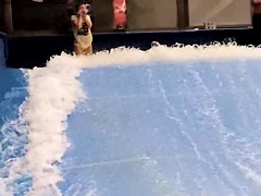 Sexy flowrider is demonstrating her downblouse in aqua park