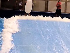 Sexy flowrider is demonstrating her downblouse in aqua park