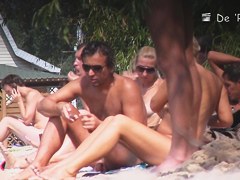 Beach nudist girls show the bodies stretched to crowd