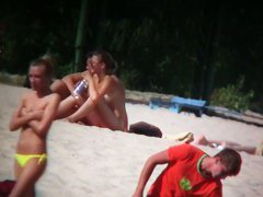 Hot images from a nude beach voyeur with naked skinny chicks