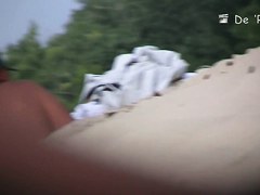 Big tits and trimmed pussy of sexy beach nudist girl