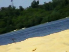 A dazzling nude beach voyeur video