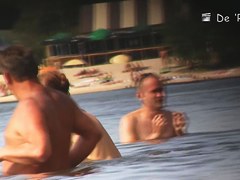Nude amateur is having entertainment on beach spy camera