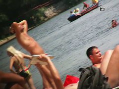 Nude beach video of hot bimbos playing in water