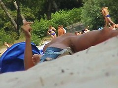 A girl from nude beach shows her butt and pussy