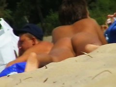 A girl from nude beach shows her butt and pussy