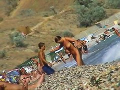 Nudist beach voyeur preys on naked mature hotties