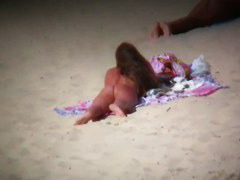 Aluring beach video of nudists enjoying the warm sun