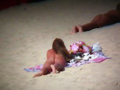 Aluring beach video of nudists enjoying the warm sun