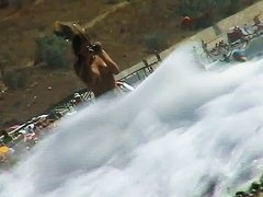 Voyeur video of nude girls having fun on a nudist beach