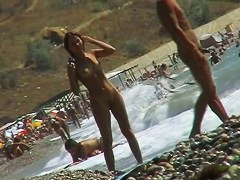 Voyeur video of nude girls having fun on a nudist beach