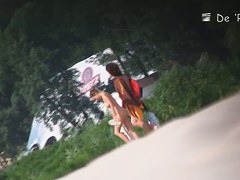 Stunning nude female body caught on a beach voyeur video