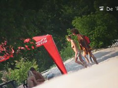Stunning nude female body caught on a beach voyeur video