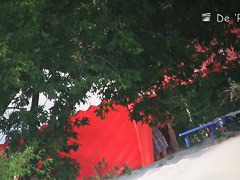 Stunning nude female body caught on a beach voyeur video