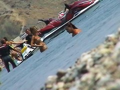 lots of very sexy naked babes on the nudist beach getting wet