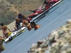 lots of very sexy naked babes on the nudist beach getting wet