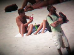 Hot naked babes exposing their pussy at the beach