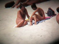 Hot naked babes exposing their pussy at the beach